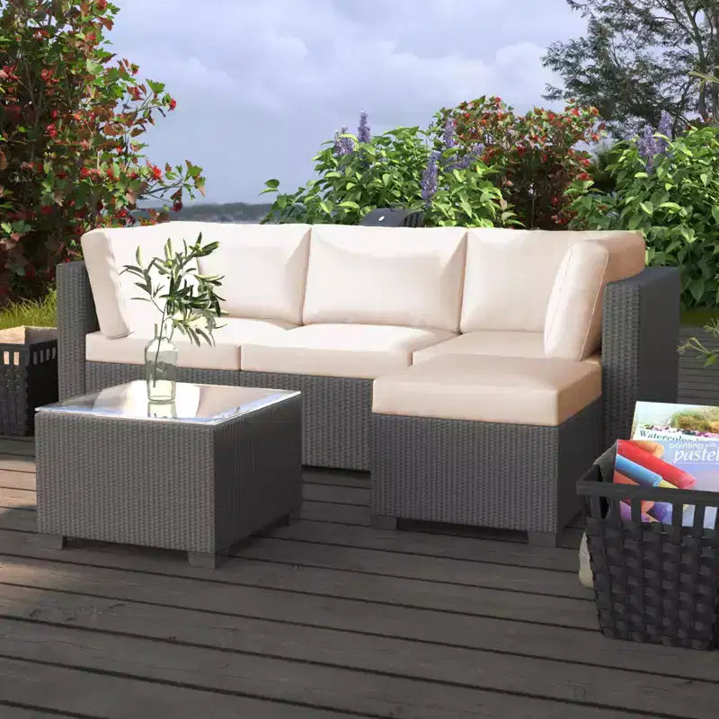 Salon de jardin 5 pièces en rotin, ensemble de conversation en rotin synthétique avec coussins de dossier épais, plateau de table en verre, pouf, beige