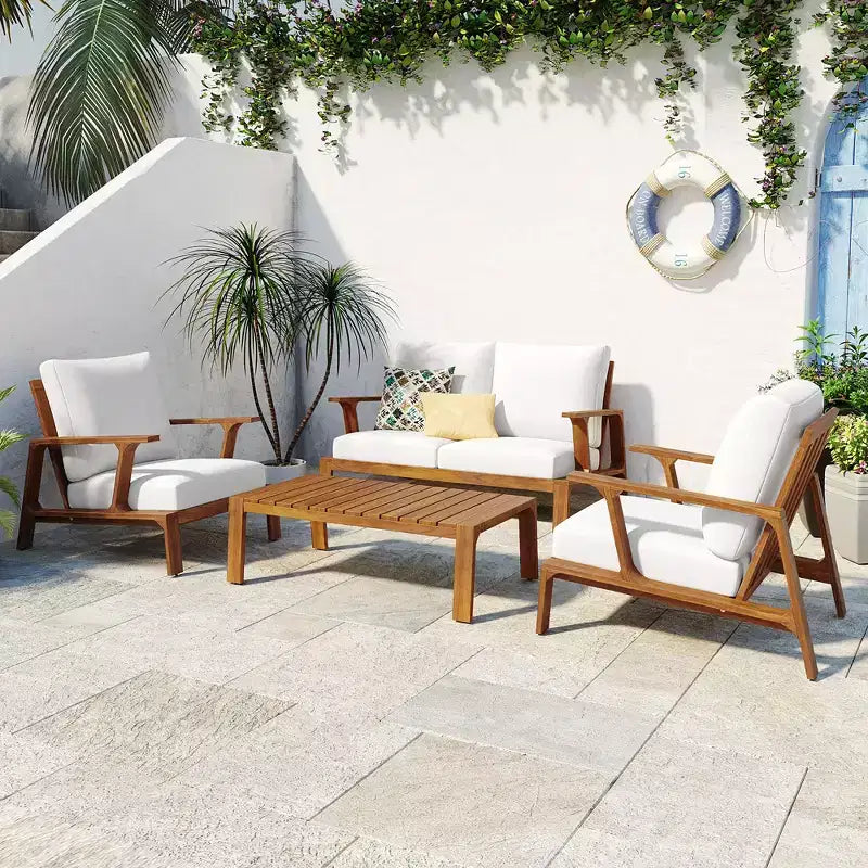 Ensemble de canapés de patio Bestier en bois d'acacia pour 4 personnes avec coussins et table basse, mobilier de patio moderne