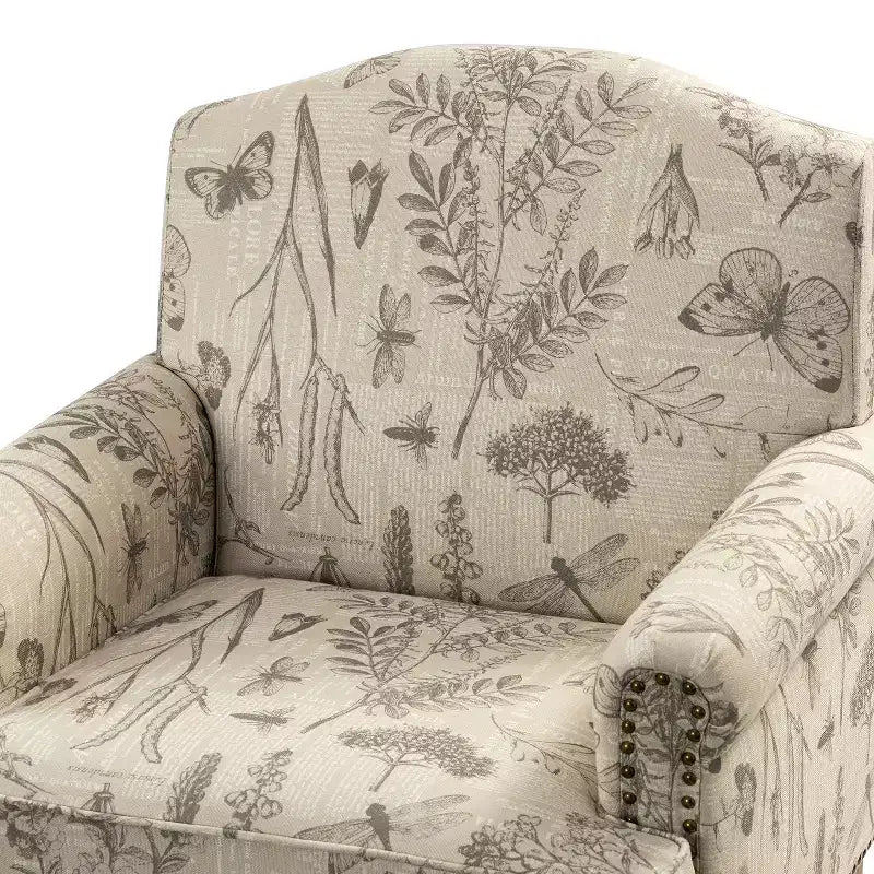 Fauteuil rembourré en bois avec motif floral, accoudoirs à panneaux et dossier en forme de bosse de chameau.